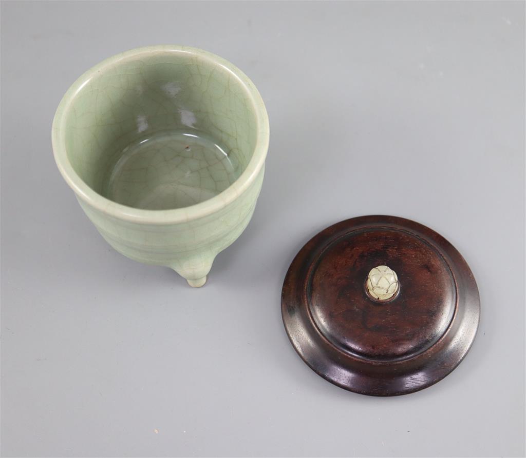 A Chinese Guan type tripod censer, 8.2cm diameter